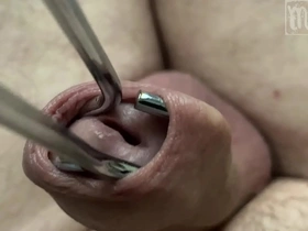 Stretching the foreskin, massaging and squeezing the glands. 4