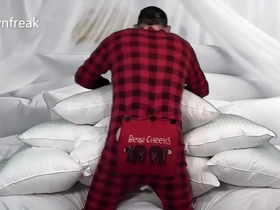 A guy humps his pillows and fucks the stuffing until he cums