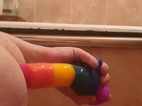 Sasha earth fucks her ass with a sex toy at home on the bed